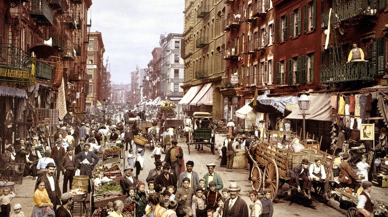 Busy crowded street wagons