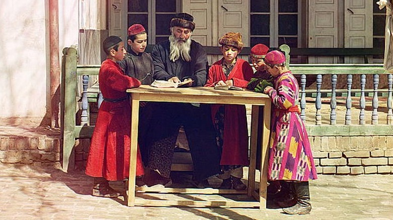 Jewish teacher students table outdoors