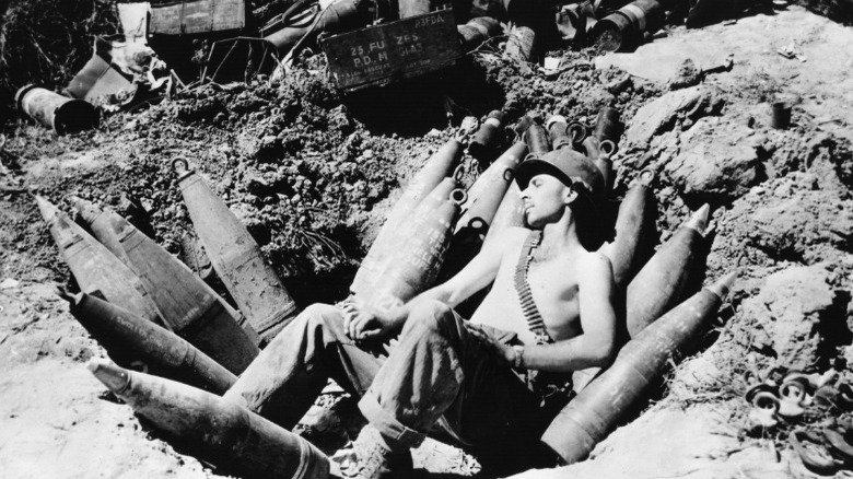 Soldier sleeping in foxhole ordnance