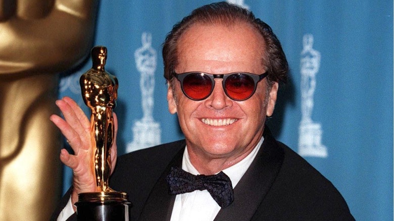 Jack Nicholson holds his Oscar