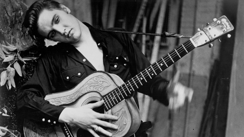 Elvis Presley with guitar 