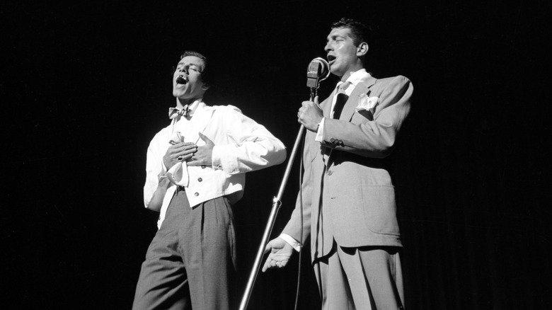 Lewis and Martin performing on stage