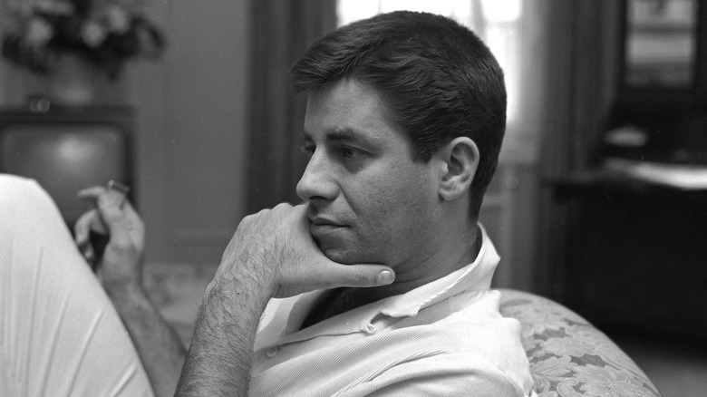 Jerry Lewis sitting on a couch
