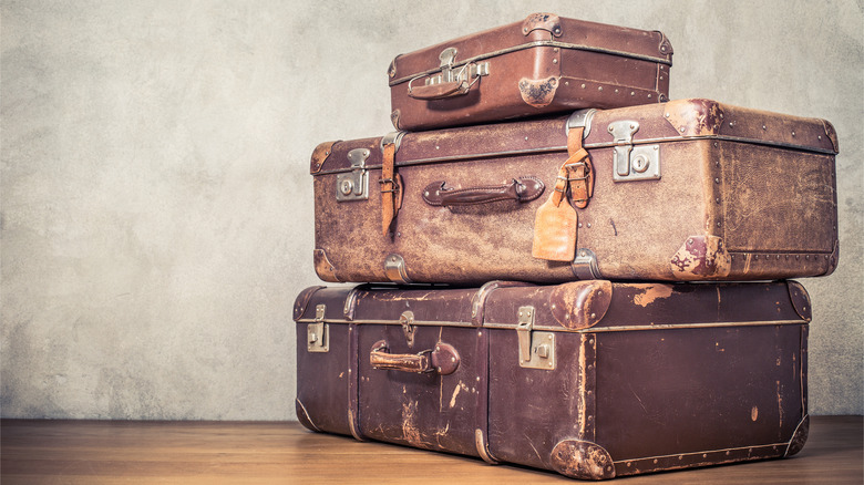 suitcases wood floor