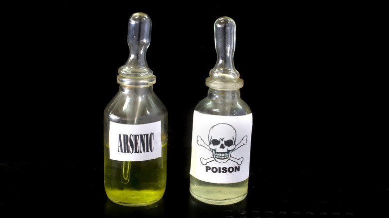 Fluid bottles labelled arsenic poison