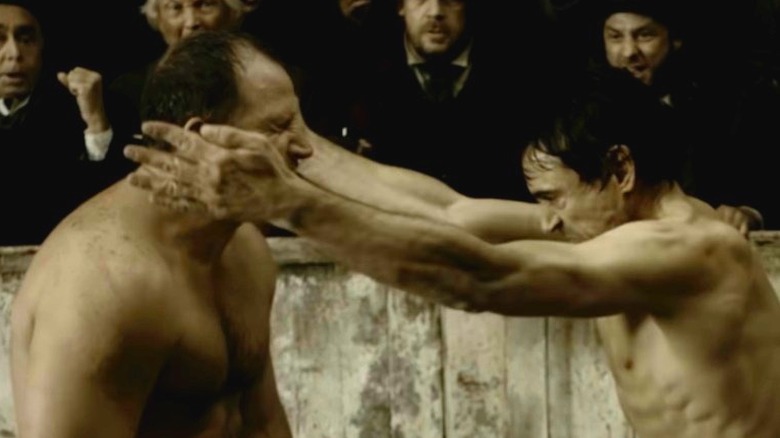 Scene from Sherlock Holmes (2009) in a bare knuckle boxer match