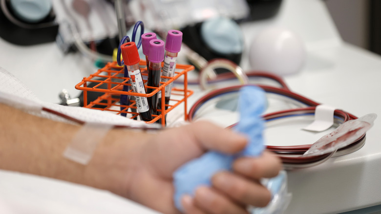 a person donating blood for testing