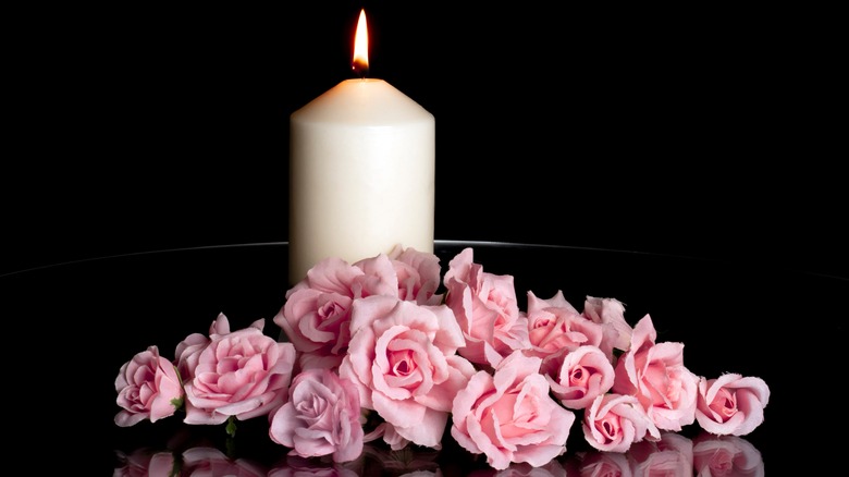 Candle and roses