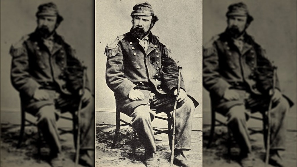 Emperor Norton sitting in a chair