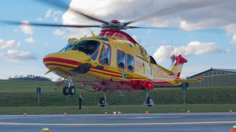 Helicopter landing at helipad