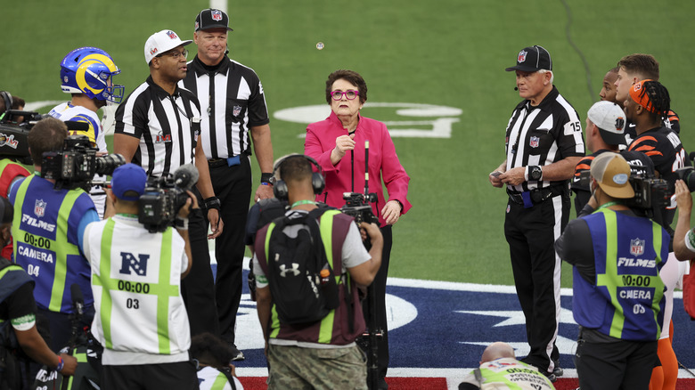 Billie Jean King flips coin