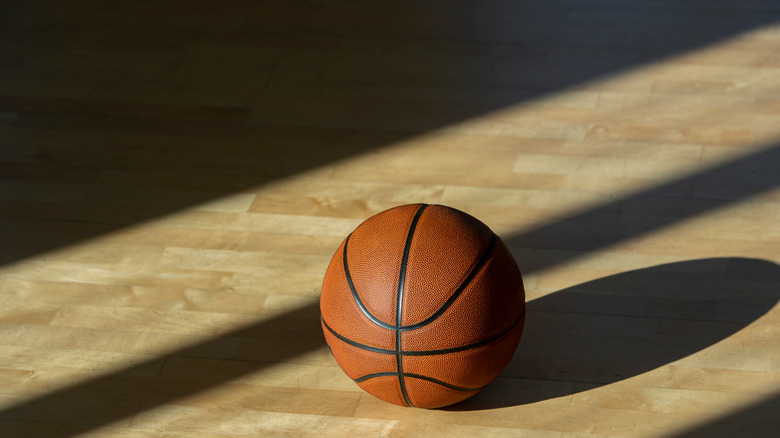 Basketball on wooden court