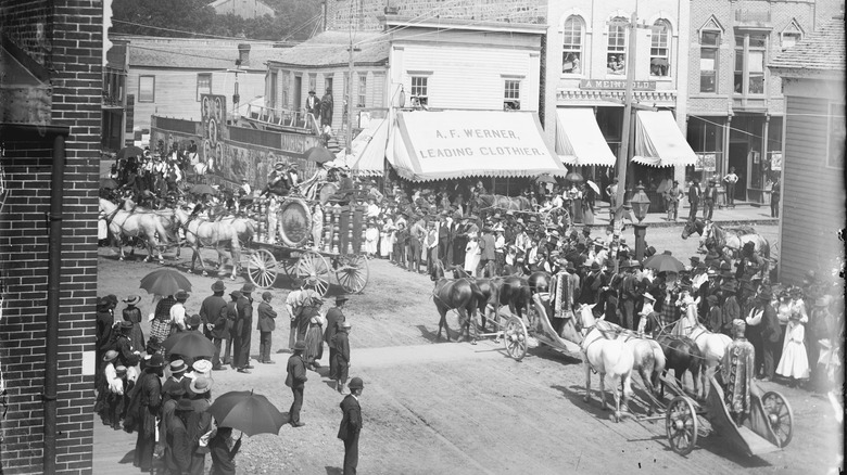 circus chariots on a town street