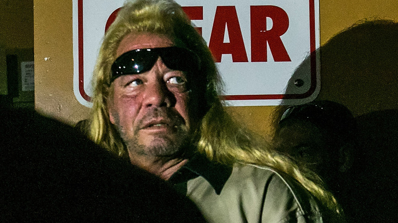 Dog the Bounty Hunter backstage at an event