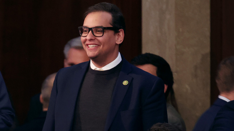 George Santos smiling in Congress