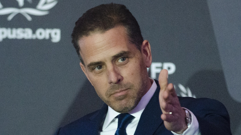 Hunter Biden gesturing with his left hand