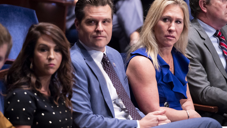 Lauren Boebert, Marjorie Taylor Greene, and Matt Gaetz sitting together