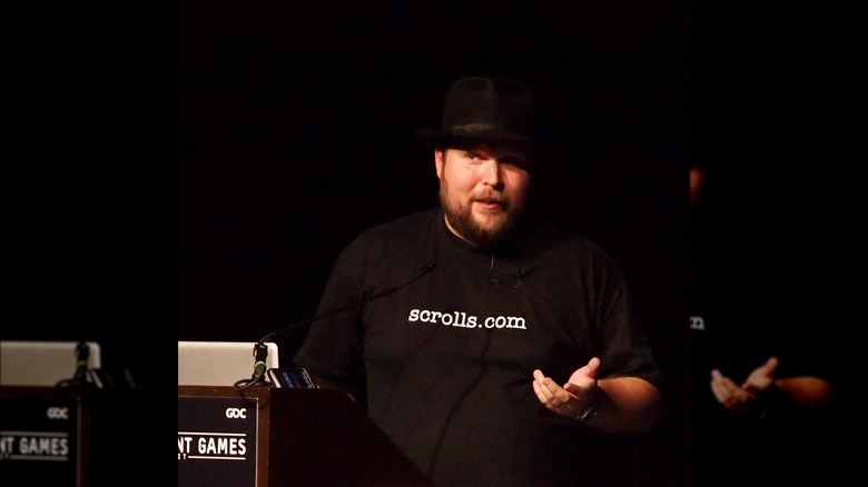 Markus Persson all black with hat
