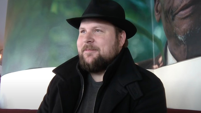 Markus Persson smirking