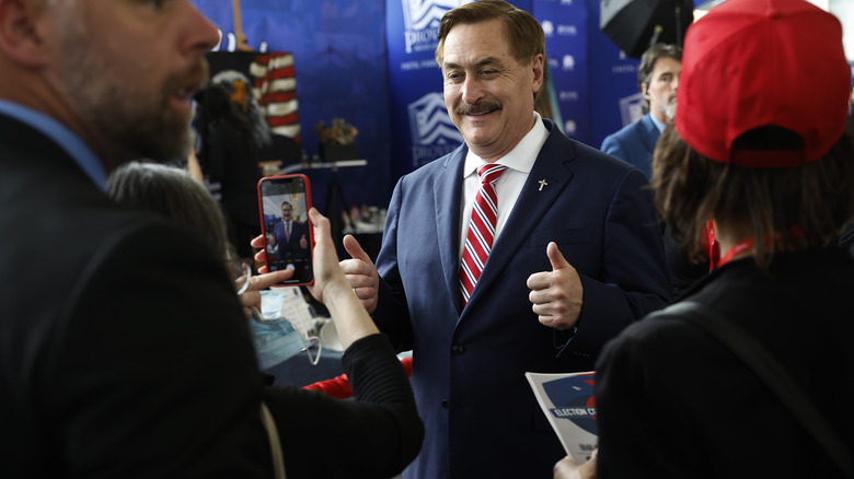 Mike Lindell posing for a photo