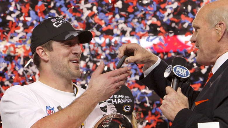 Aaron Rodgers and Terry Bradshaw speaking 