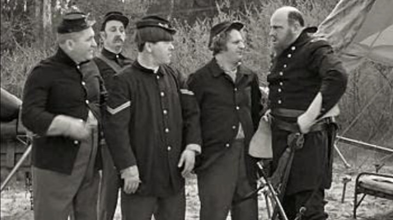 Three Stooges dressed in military uniform