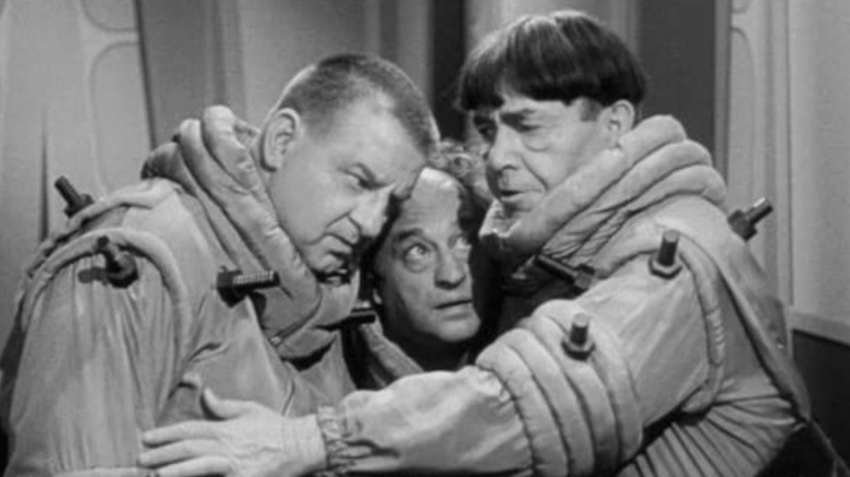 The Three Stooges huddled up