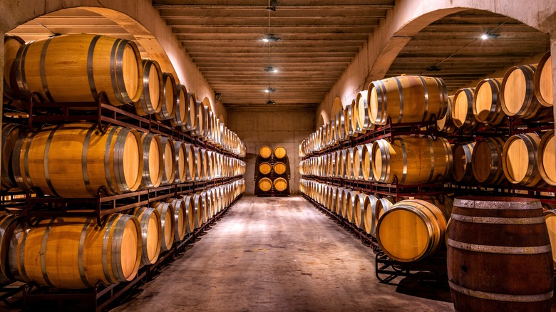 Wine cellar French wooden barrels.