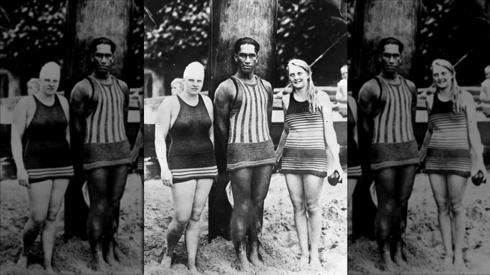 Duke Kahanamoku and unidentified women