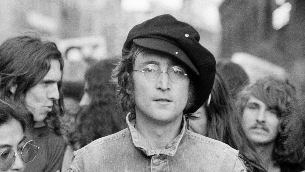 John Lennon in a crowded city street