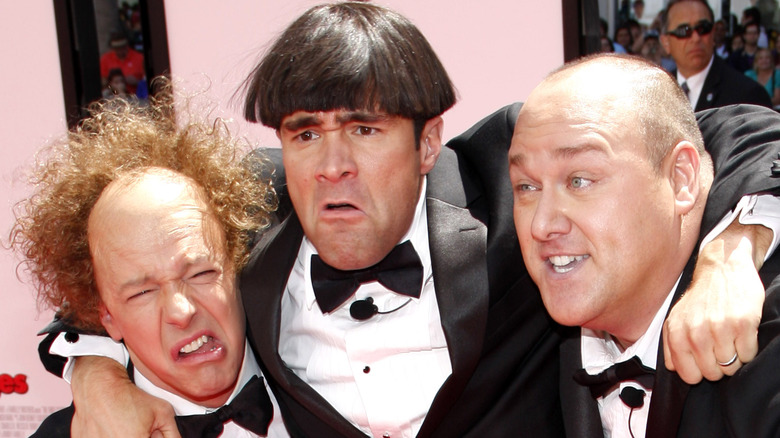 Three Stooges impersonators walk red carpet