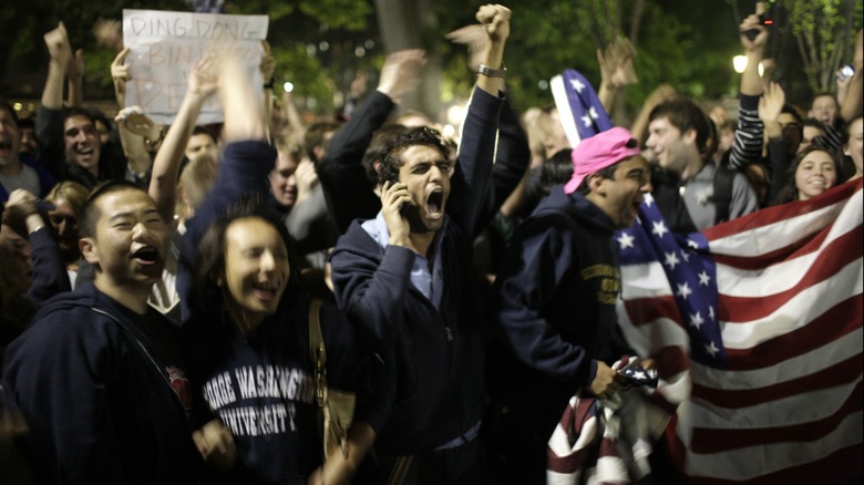 Crowd of people cheering