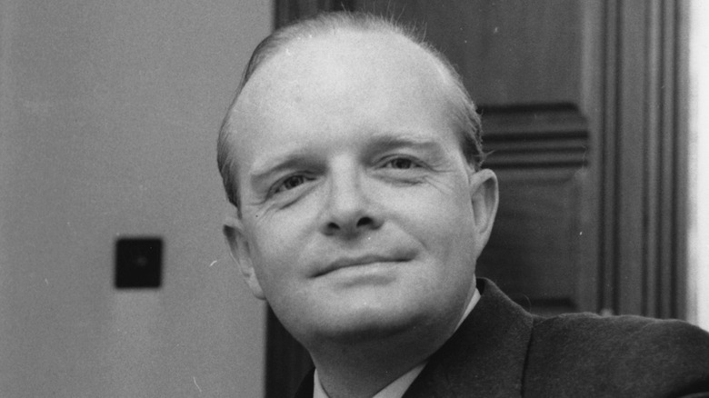 Truman Capote smiling