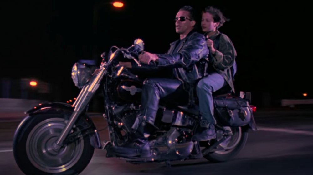 Arnold Schwarzenegger as the Terminator on a motorcycle