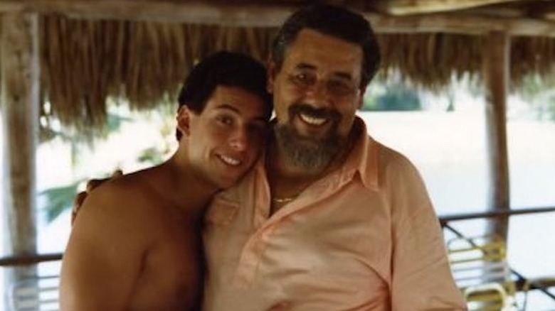 young adam sandler hugging father stanley smiling