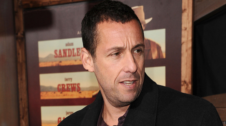 adam sandler smiling black shirt at event