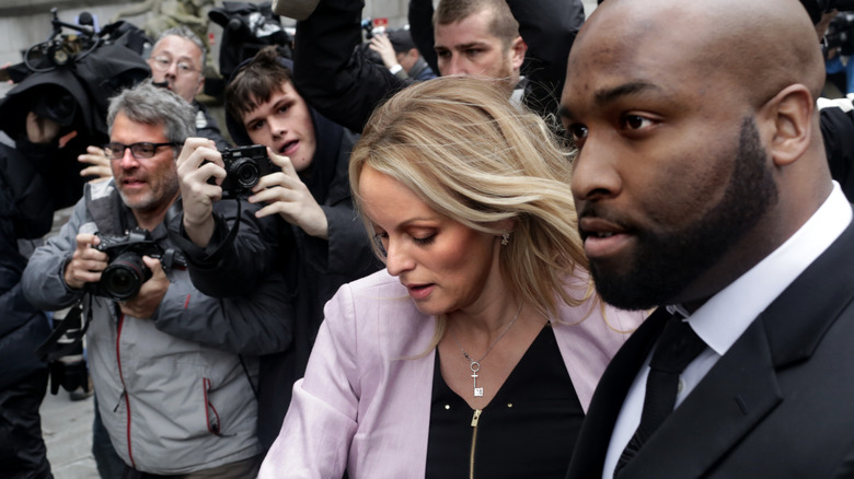 Stormy Daniels swarmed by photographers