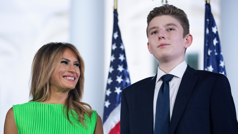 Melania Trump smiling up at Barron Trump