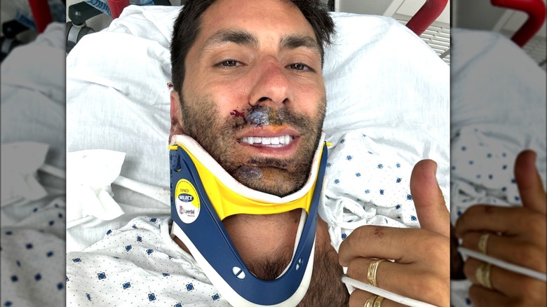 Nev Schulman with neck brace 