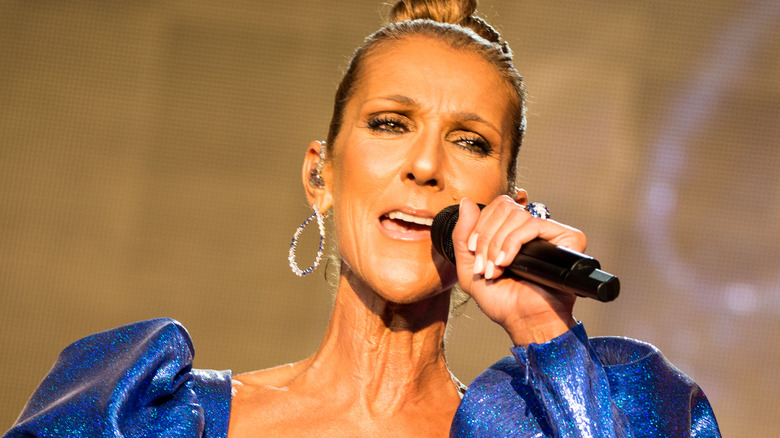 celine dion singing in blue dress