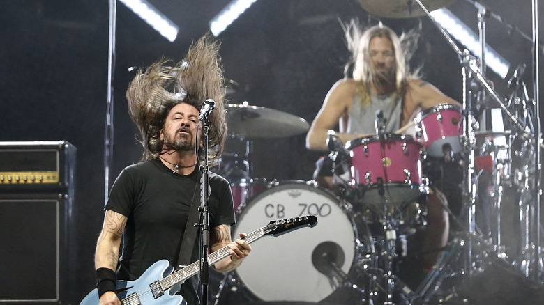 Dave Grohl Taylor Hawkins performing onstage