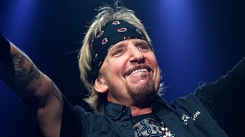 jack russell bandanna smiling onstage