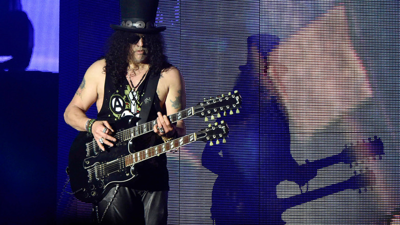 Slash hat performing on stage