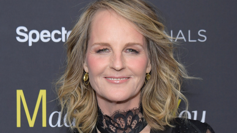 helen hunt grinning at camera with black neckwear