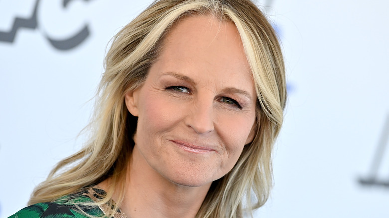 helen hunt green striped dress looking away from camera