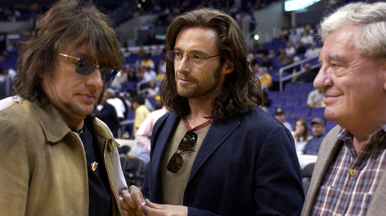 Hugh Jackman long hair with father and Richie Sambora at event