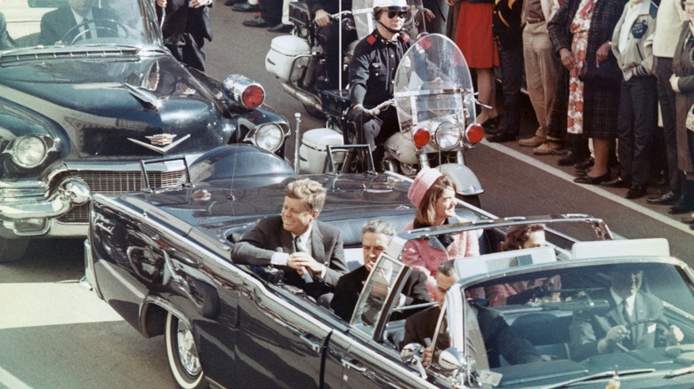 John F. Kennedy and Jackie Kennedy in the Dallas motorcade ahead of the assassination