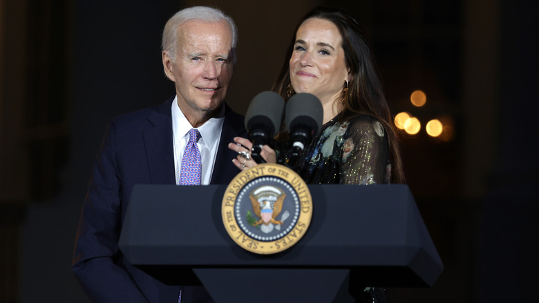 Ashley Biden at a podium with her father Joe Biden