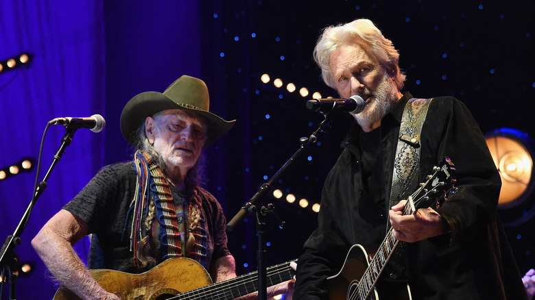 Kris Kristofferson performing with Willie Nelson