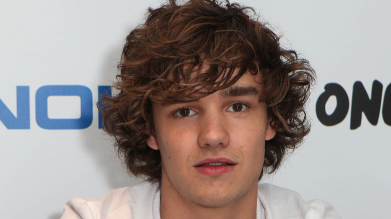 Liam Payne with long, tousled hair